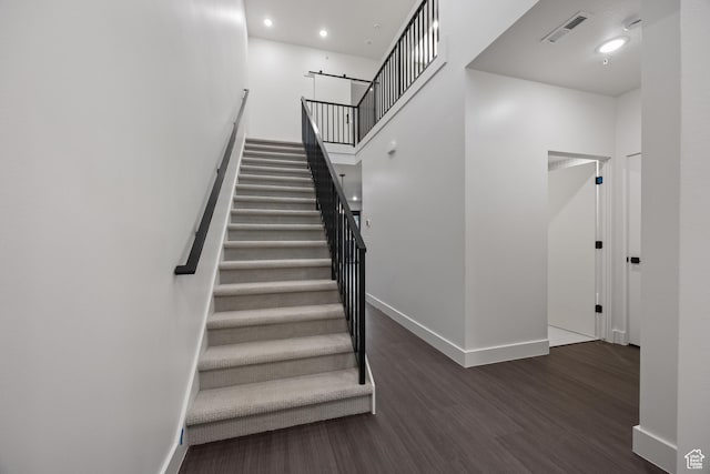 3884 N 4975 E Unit B207, Eden, UT 84310 - staircase with recessed lighting, wood finished floors, visible vents, and baseboards