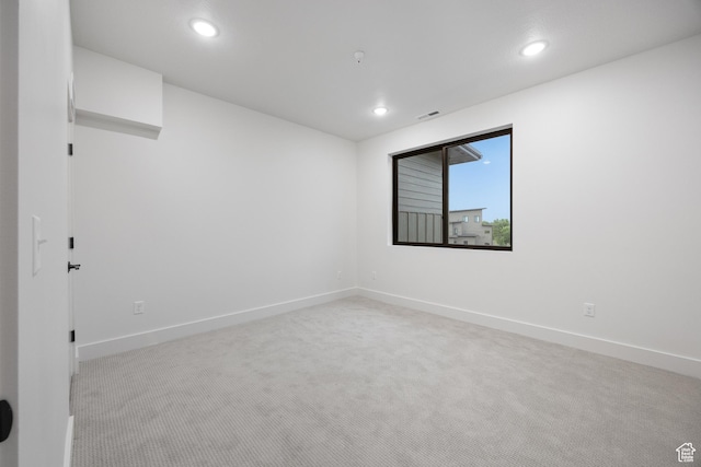 3884 N 4975 E Unit B207, Eden, UT 84310 - empty room with light colored carpet, baseboards, visible vents, and recessed lighting