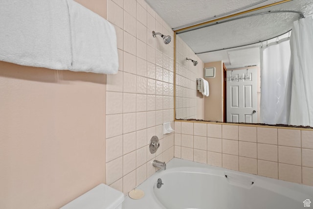 1845 W Canyon Dr S Unit 1610, St George, UT 84770 - full bathroom featuring a textured ceiling, shower / bath combo, and toilet