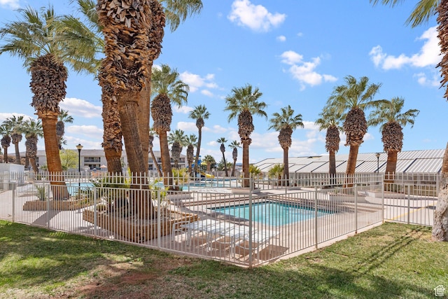 1845 W Canyon Dr S Unit 1610, St George, UT 84770 - community pool featuring a patio, a yard, fence, and a residential view
