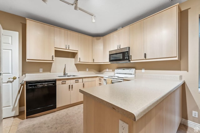 710 E Ridge Crest Ct S, Alpine, UT 84004 - kitchen with a peninsula, light brown cabinetry, a sink, electric stove, and dishwasher