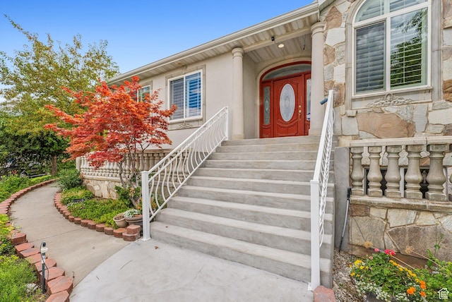 710 E Ridge Crest Ct S, Alpine, UT 84004 - doorway to property with stone siding and stucco siding