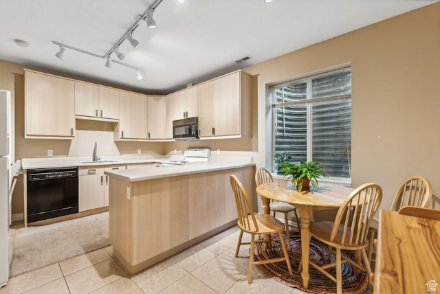 710 E Ridge Crest Ct S, Alpine, UT 84004 - kitchen featuring a peninsula, a sink, light countertops, black dishwasher, and range