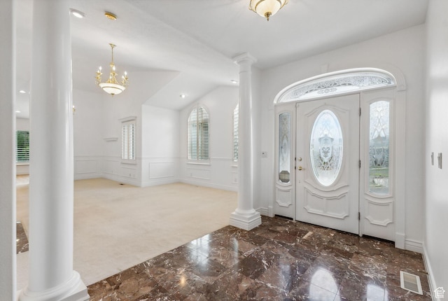 710 E Ridge Crest Ct S, Alpine, UT 84004 - entrance foyer with visible vents, marble finish floor, wainscoting, a decorative wall, and ornate columns