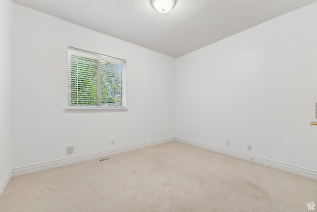 710 E Ridge Crest Ct S, Alpine, UT 84004 - spare room with visible vents, baseboards, and carpet flooring