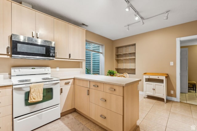 710 E Ridge Crest Ct S, Alpine, UT 84004 - kitchen featuring stainless steel microwave, light brown cabinetry, light countertops, a peninsula, and white range with electric stovetop