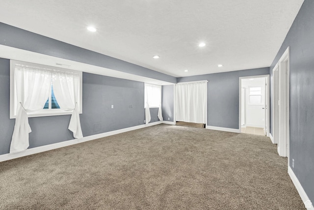1461 E Antelope Dr, Layton, UT 84040 - below grade area with a wealth of natural light, baseboards, carpet, and recessed lighting