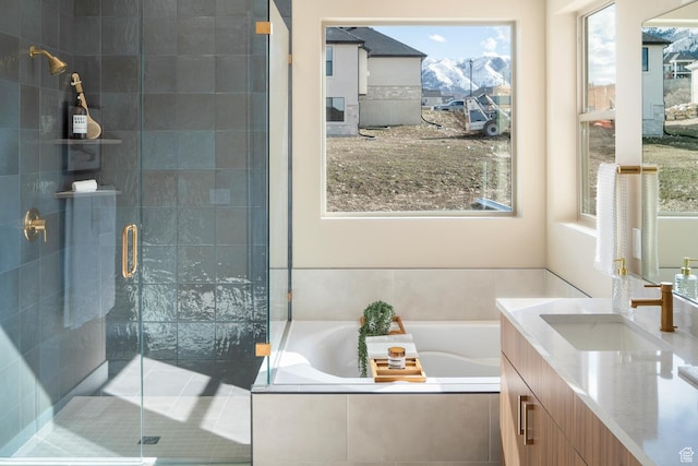 882 E 740 S, Salem, UT 84653 - bathroom featuring vanity, healthy amount of natural light, a stall shower, and a garden tub