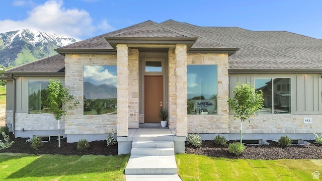 882 E 740 S, Salem, UT 84653 - view of front of property featuring stone siding, a shingled roof, a mountain view, and a front yard