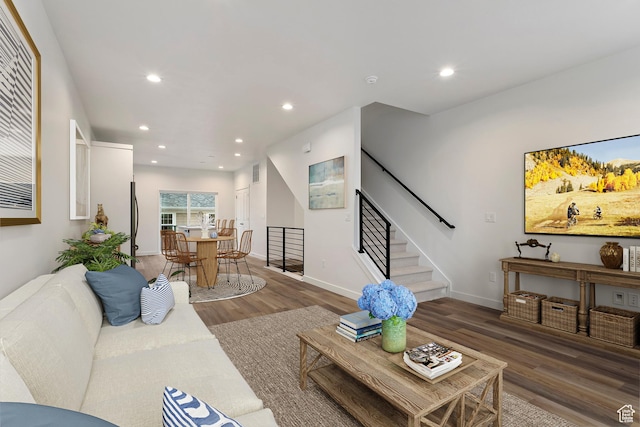7007 W S Jordan Pkwy Unit 374, South Jordan, UT 84009 - living room with wood finished floors, stairway, recessed lighting, and baseboards