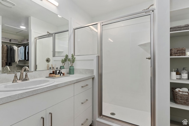 7007 W S Jordan Pkwy Unit 374, South Jordan, UT 84009 - bathroom with vanity, a shower stall, and a spacious closet