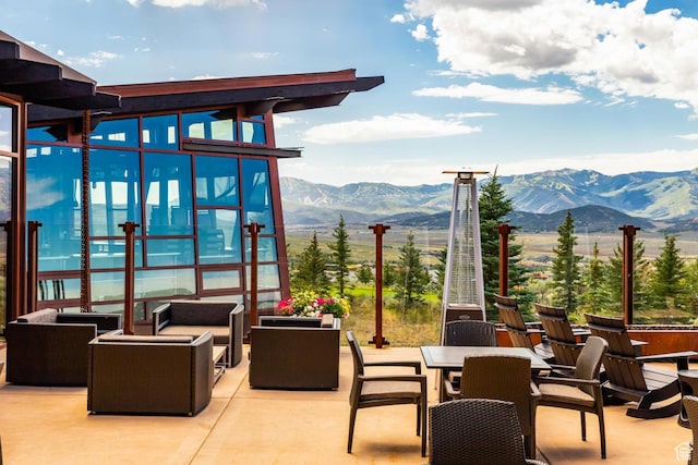 6902 Painted Valley Pass, Park City, UT 84098 - view of patio / terrace featuring outdoor dining space, a mountain view, and an outdoor hangout area