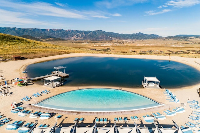 6902 Painted Valley Pass, Park City, UT 84098 - view of swimming pool with a water and mountain view