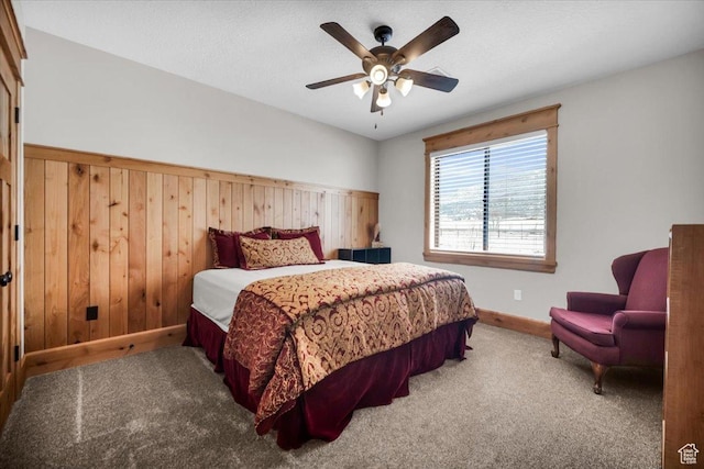 29125 N 11090 E, Fairview, UT 84629 - bedroom with carpet, wood walls, and a ceiling fan