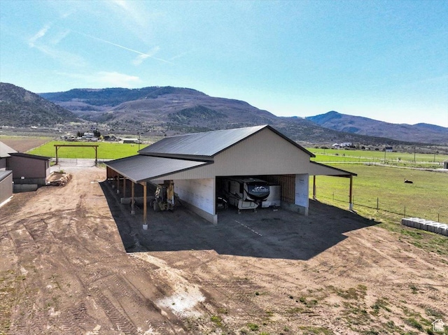 29125 N 11090 E, Fairview, UT 84629 - exterior space with a mountain view, a rural view, fence, dirt driveway, and an outbuilding