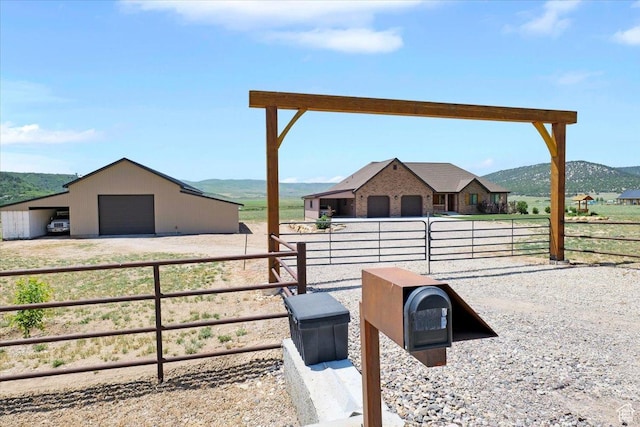 29125 N 11090 E, Fairview, UT 84629 - view of yard with a garage, an outbuilding, a mountain view, and a rural view