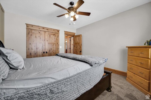 29125 N 11090 E, Fairview, UT 84629 - bedroom featuring light carpet, baseboards, and a ceiling fan