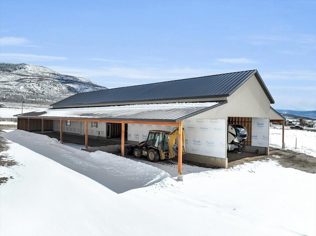 29125 N 11090 E, Fairview, UT 84629 - snow covered rear of property featuring a mountain view and metal roof