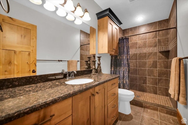 29125 N 11090 E, Fairview, UT 84629 - bathroom with tile patterned flooring, toilet, tiled shower, and vanity