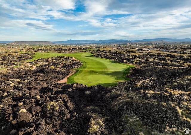 2139 W Cougar Rock Cir S Unit 135, St George, UT 84770 - bird's eye view of a mountain backdrop and a golf course