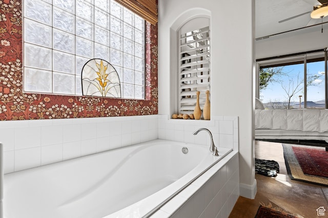 2139 W Cougar Rock Cir S Unit 135, St George, UT 84770 - bathroom featuring a garden tub, wallpapered walls, and ceiling fan