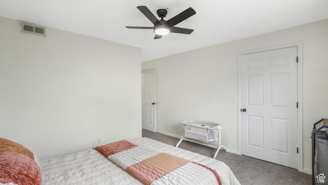 3477 E Rdg Route Rd Unit 5, Eagle Mountain, UT 84005 - bedroom with baseboards, visible vents, carpet floors, and ceiling fan