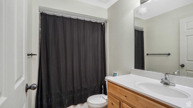 3477 E Rdg Route Rd Unit 5, Eagle Mountain, UT 84005 - full bathroom featuring toilet and vanity