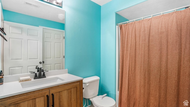 3477 E Rdg Route Rd Unit 5, Eagle Mountain, UT 84005 - bathroom with visible vents, vanity, a shower with shower curtain, and toilet
