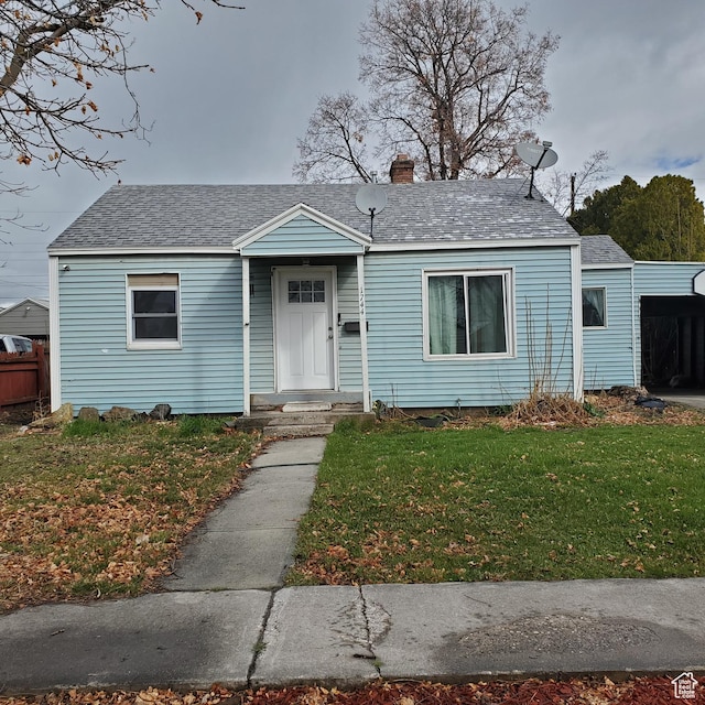 1744 W 150 N, Provo, UT 84601 - bungalow-style house with a shingled roof, a front yard, and a chimney