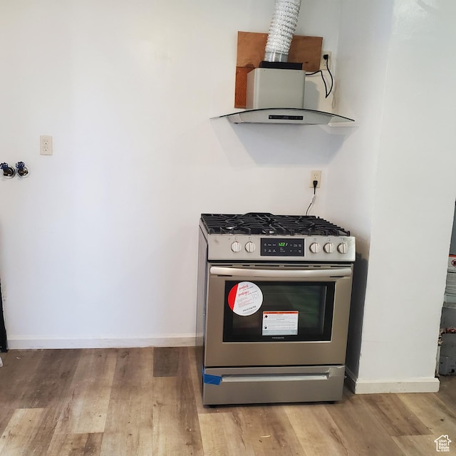 1744 W 150 N, Provo, UT 84601 - kitchen featuring stainless steel gas range oven, baseboards, and light wood-style flooring