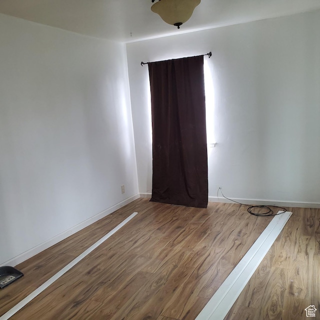 1744 W 150 N, Provo, UT 84601 - unfurnished room featuring baseboards and wood finished floors