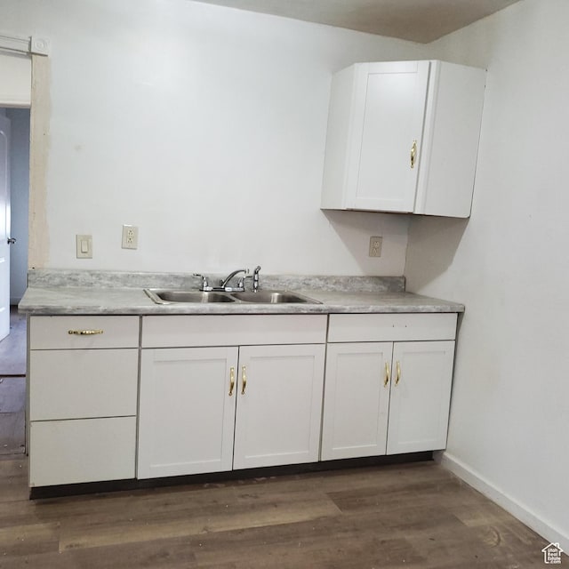 1744 W 150 N, Provo, UT 84601 - kitchen featuring baseboards, dark wood finished floors, light countertops, white cabinetry, and a sink