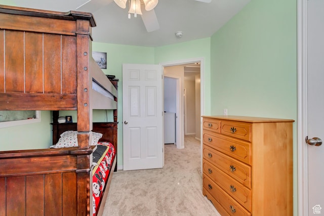 bedroom featuring light colored carpet