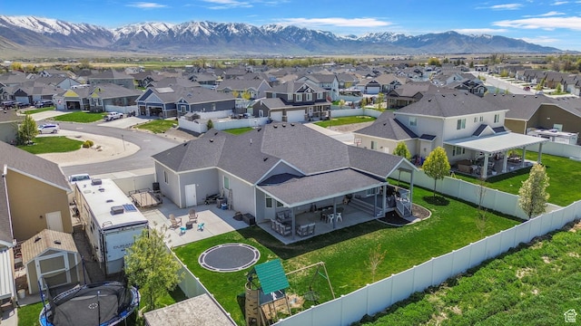 5131 N Stratford Dr W, Stansbury Park, UT 84074 - drone / aerial view featuring a mountain view and a residential view