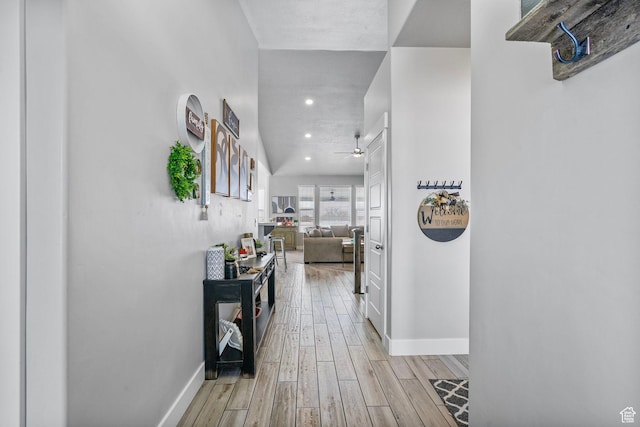 5131 N Stratford Dr W, Stansbury Park, UT 84074 - hall with recessed lighting, light wood finished floors, and baseboards