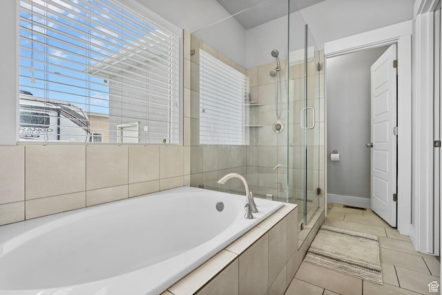 5131 N Stratford Dr W, Stansbury Park, UT 84074 - full bathroom featuring a shower stall, a healthy amount of sunlight, tile patterned floors, and a garden tub