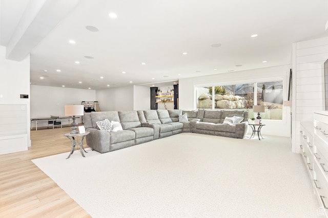 living area featuring recessed lighting and light wood-style floors