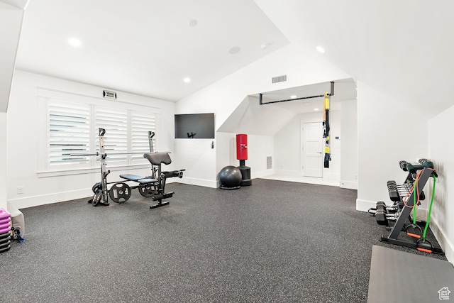 exercise area featuring visible vents, recessed lighting, baseboards, and lofted ceiling