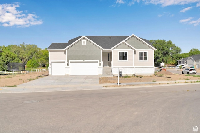 1811 N 375 W Unit 8, Harrisville, UT 84404 - view of front facade with concrete driveway and a garage