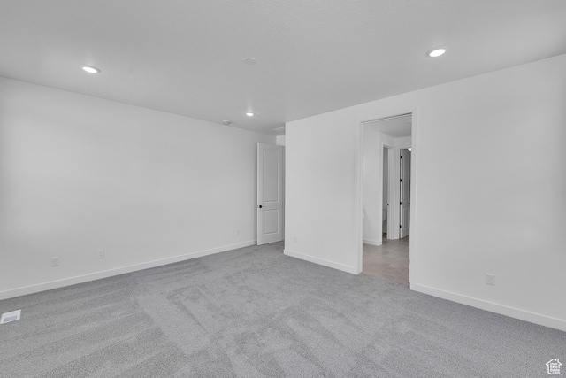 1811 N 375 W Unit 8, Harrisville, UT 84404 - spare room featuring carpet and recessed lighting