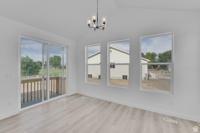1811 N 375 W Unit 8, Harrisville, UT 84404 - unfurnished dining area with a chandelier, wood finished floors, and high vaulted ceiling