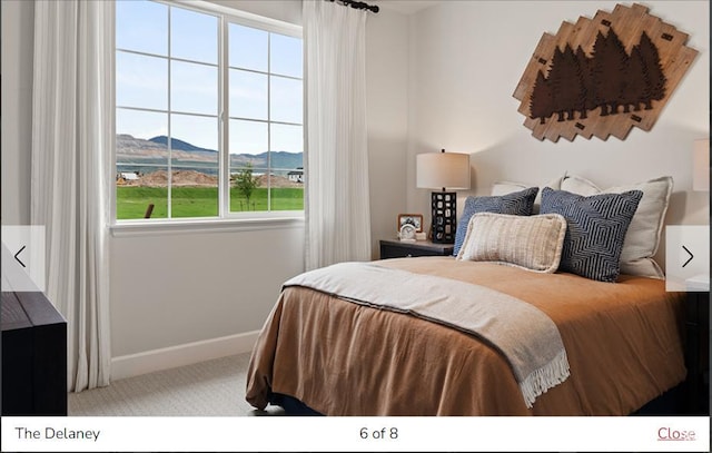 1170 N 375 W Unit 23, Harrisville, UT 84404 - carpeted bedroom featuring a mountain view and baseboards