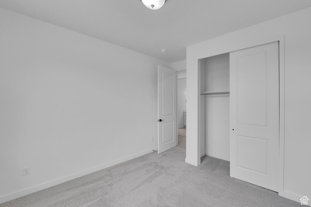 406 W 1225 N Unit 4, Harrisville, UT 84404 - unfurnished bedroom featuring carpet floors and a closet