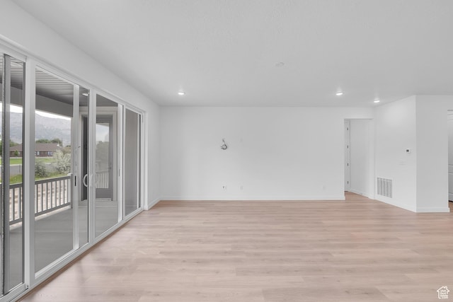 406 W 1225 N Unit 4, Harrisville, UT 84404 - spare room featuring recessed lighting and light wood-style flooring