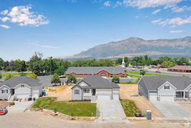 406 W 1225 N Unit 4, Harrisville, UT 84404 - aerial view of residential area featuring a mountain backdrop