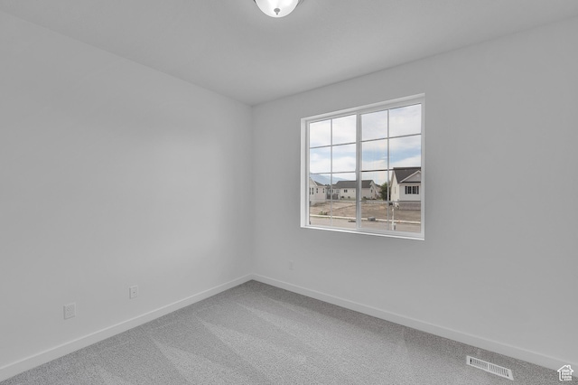 406 W 1225 N Unit 4, Harrisville, UT 84404 - spare room with baseboards and carpet flooring