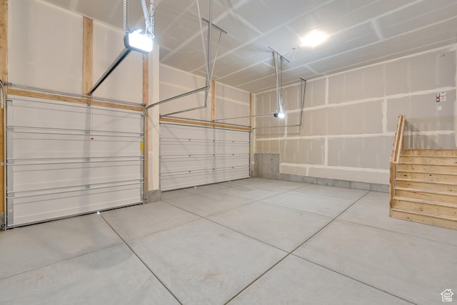 406 W 1225 N Unit 4, Harrisville, UT 84404 - garage featuring a garage door opener