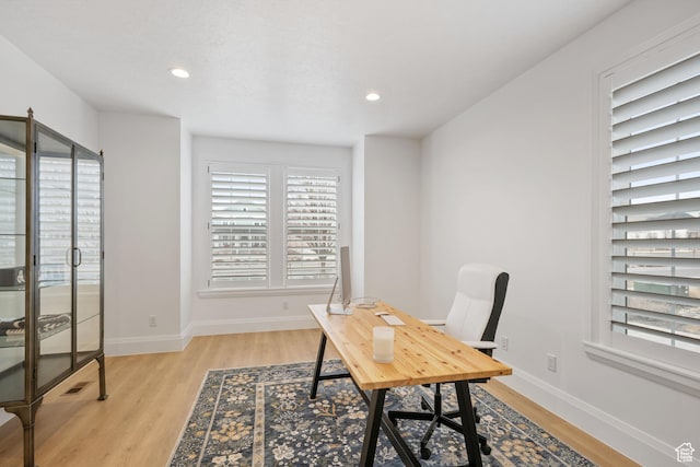 238 W Founders Blvd, Saratoga Springs, UT 84045 - office area with baseboards, a healthy amount of sunlight, and light wood finished floors