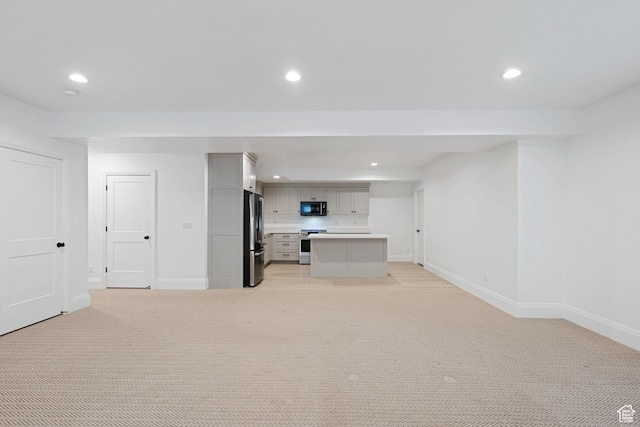 238 W Founders Blvd, Saratoga Springs, UT 84045 - unfurnished living room featuring recessed lighting, light colored carpet, and baseboards