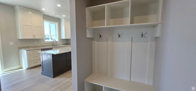 201 W 1300 S Unit 32, Tremonton, UT 84337 - mudroom with light wood-style flooring, recessed lighting, a sink, and baseboards
